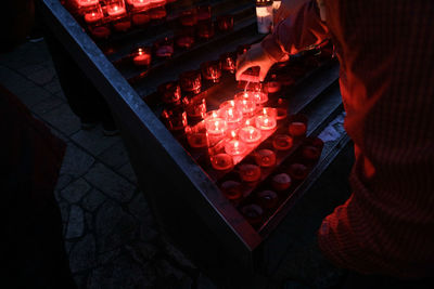 High angle view of people at illuminated shop