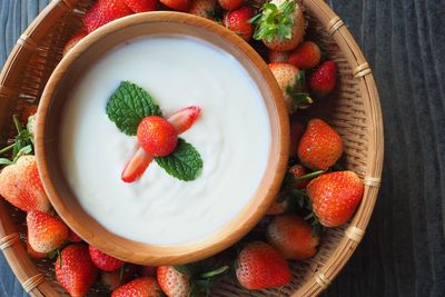High angle view of strawberries in plate on table