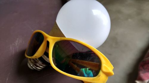 Close-up of sunglasses on table