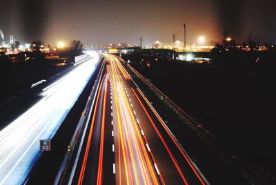 Light trails on road at night