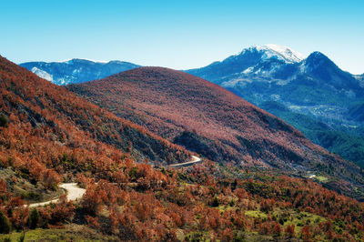 Scenic view of mountains against clear sky