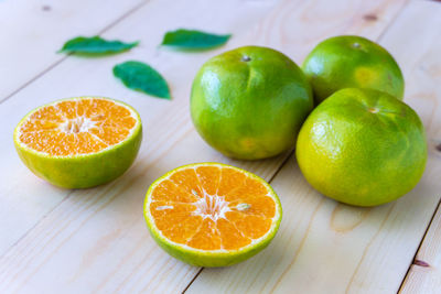 Close-up of oranges on table