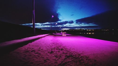 Illuminated water at night