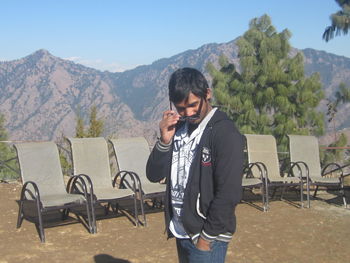 Man on mountains against sky