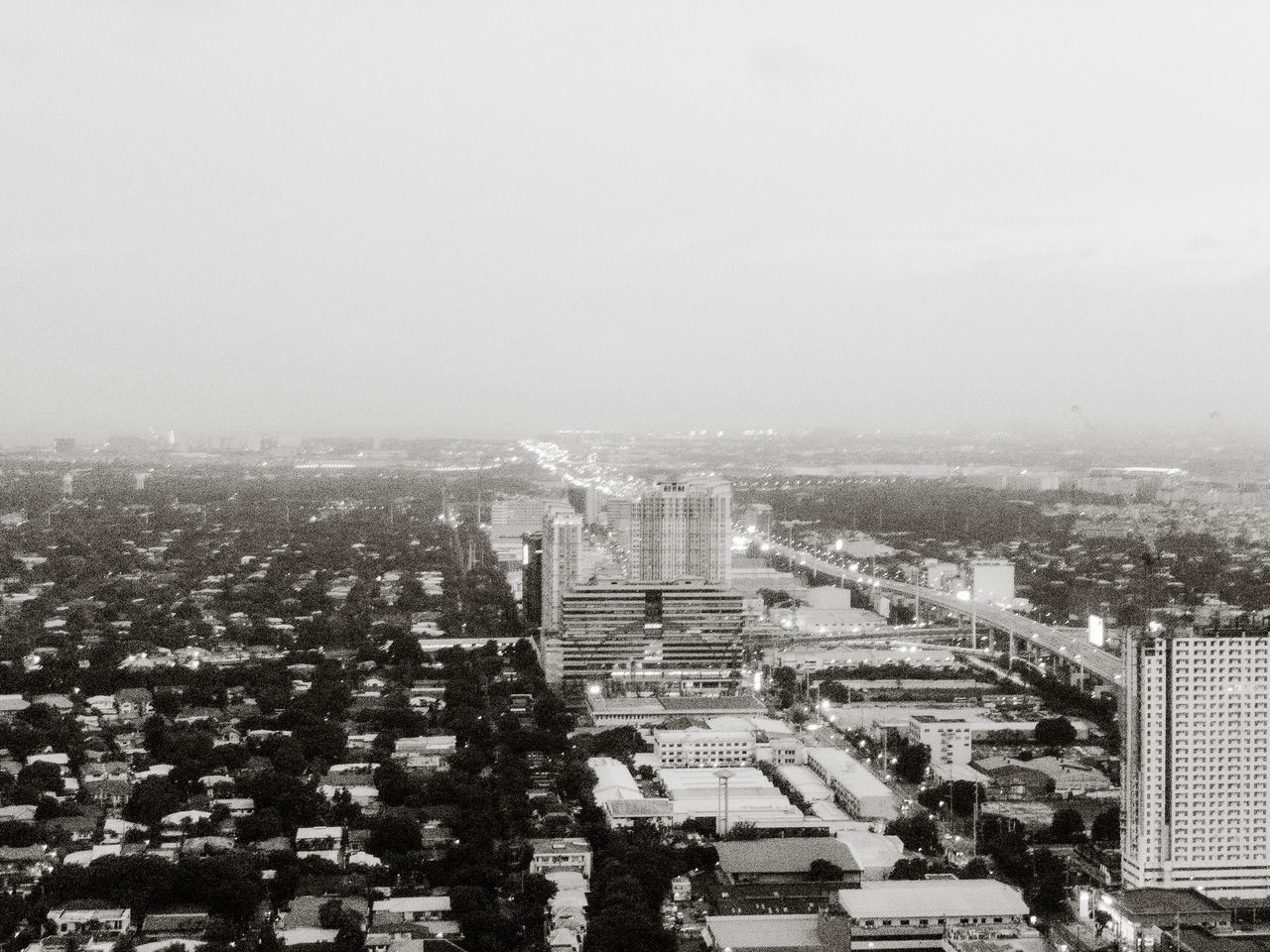 HIGH ANGLE VIEW OF BUILDINGS IN CITY