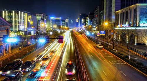 High angle view of light trails on city street