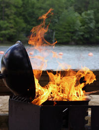 Close-up of burning fire on barbecue grill