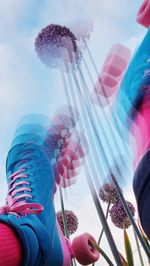 Midsection of woman with colorful balloons