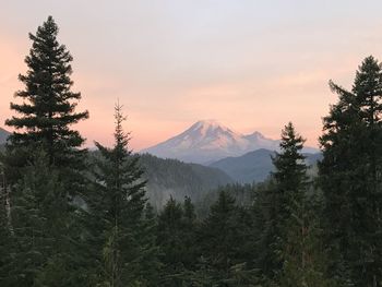 Scenic view of mountains against sky during sunset