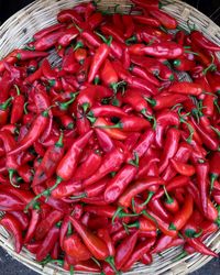 High angle view of red chili peppers in market