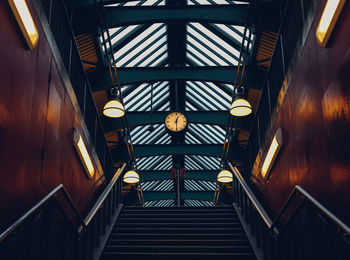 Low angle view of illuminated staircase in building