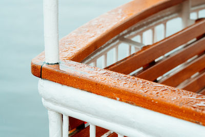 Close-up of wet boat railing