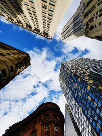 Low angle view of skyscrapers against sky