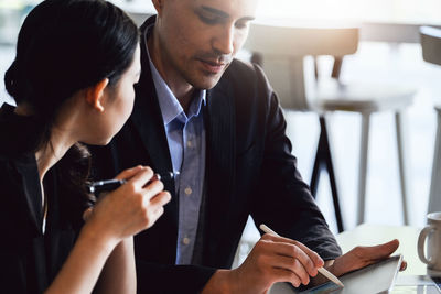 Business colleagues working at office