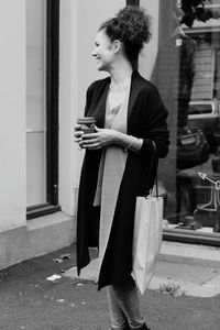 Young woman standing on street