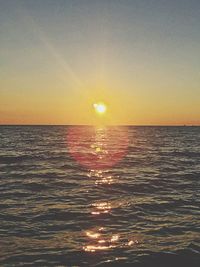 Scenic view of sea at sunset