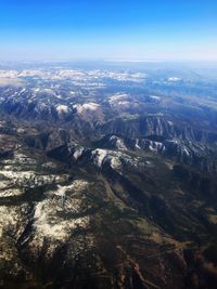 Aerial view of dramatic landscape against sky