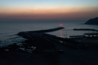 Scenic view of sea against sky at dusk