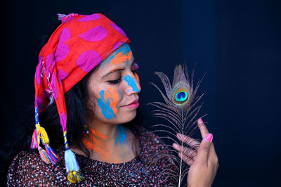 A young girl celebrating the festival of colours, holi.