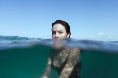 Portrait of man swimming in sea