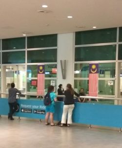 People standing in corridor