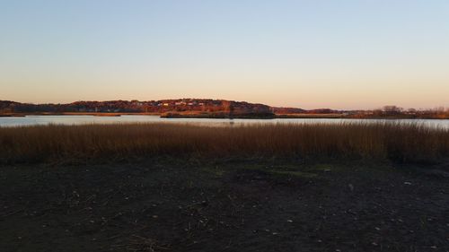 Scenic view of calm sea against clear sky