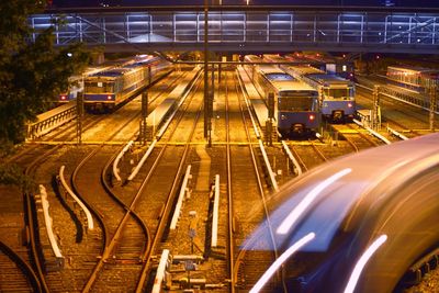 Light trails on railroad tracks at night