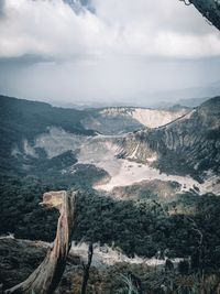 Aerial view of landscape and mountains against sky