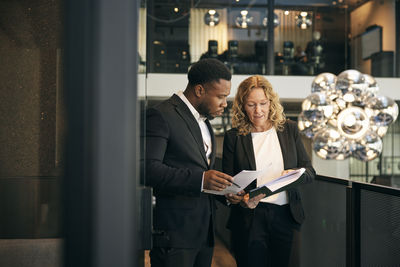 Business colleagues working in office
