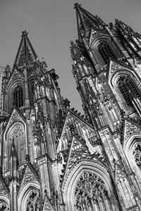 Low angle view of bell tower against sky