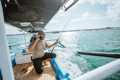 Man sailing in sea