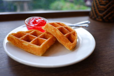 High angle view of dessert in plate on table