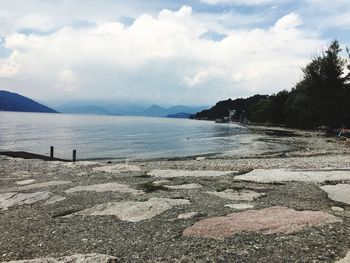 Scenic view of sea against cloudy sky