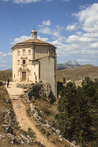 Historic church against sky in calascio