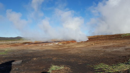 Panoramic view of volcanic landscape against sky