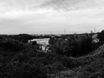 People on landscape against sky