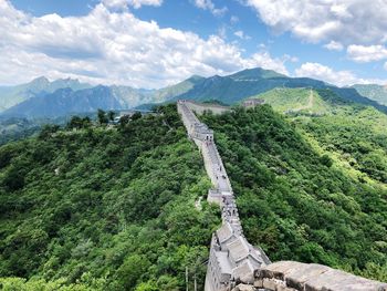 Scenic view of mountain against cloudy sky