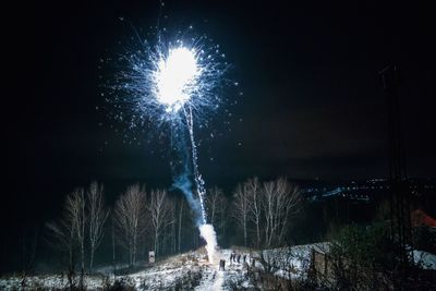 Firework display at night during winter