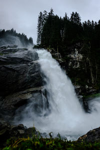 Scenic view of waterfall in forest