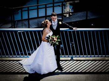 Full length of woman sitting on bench