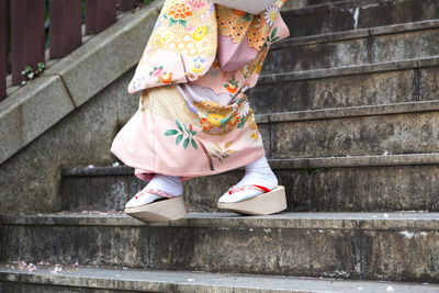 Low section of a woman in traditional clothes