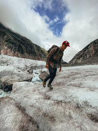 Low angle shot of climber ascending over glacier in chamonix