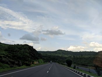 Empty road against sky