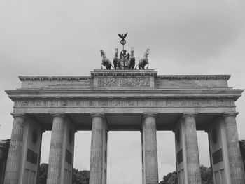 Low angle view of brandenburg gate against sky