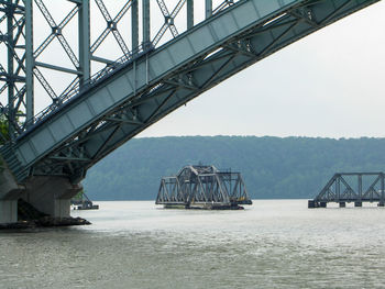 View of bridge over sea against sky