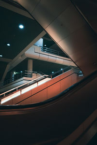 Low angle view of illuminated staircase in building