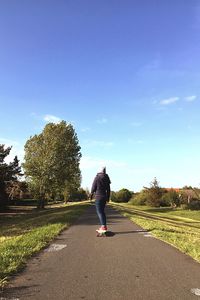 Man walking on road