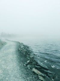 Scenic view of sea during foggy weather