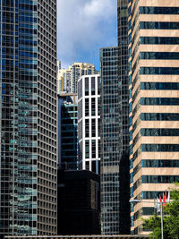 Low angle view of modern buildings against sky