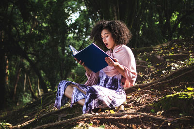 Young woman using digital tablet
